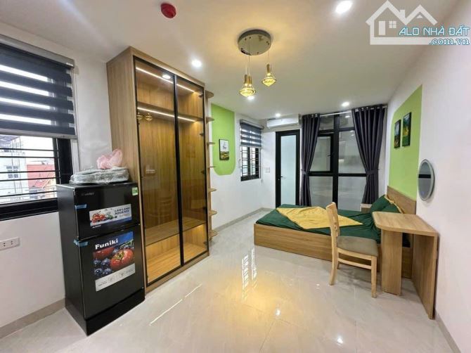 BÁN TÒA NHÀ 8T THANG MÁY  MẶT PHỐ CỰ LỘC ÔTÔ TRÁNH 90M 18P DÒNG TIỀN 1.8TỶ/NĂM - 2