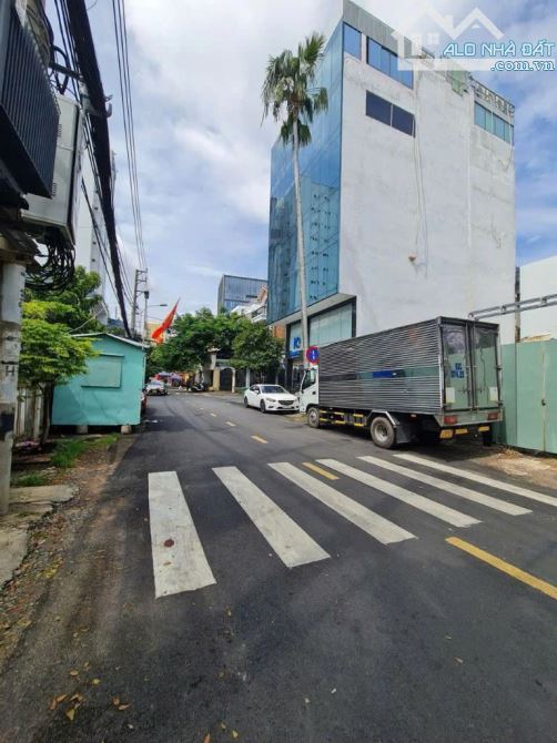 Bán Building 2 mặt tiền đường Nguyễn Huy Tưởng. DT: 13*18M. Hầm- 8 tầng. HĐT: 300tr/tháng - 2
