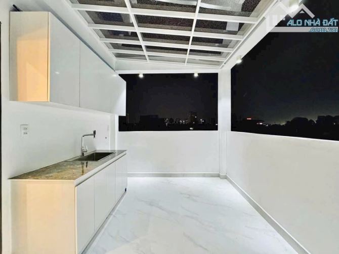 NHÀ GÒ VẤP CÓ THANG MÁY 4X16M 10,5 TỶ 5 TẦNG CÓ GARA Ô TÔ ĐƯỜNG THỐNG NHẤT P16 - 2