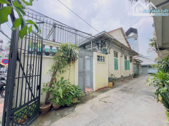 BÁN NHÀ MẶT TIỀN NGUYỄN HUY TƯỞNG,NƠ TRANG LONG,P14,BÌNH THẠNH.11M X 21M. GIÁ 40 CÒN 38 TỶ - 2