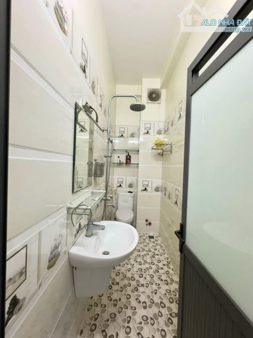 Nhà HXH VẠn Kiếp - Phan Xích Long -57m2 -4 tầng -4 PN - sổ Vuông -6.X - 3