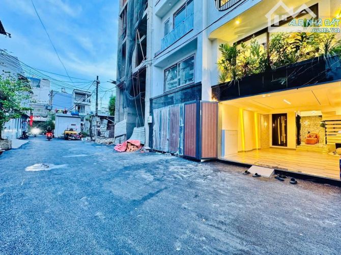 SIÊU PHẨM NHÀ PHỐ 4 TẦNG CÓ THANG MÁY - HẺM XE HƠI 8m THÔNG THOÁNG - 3