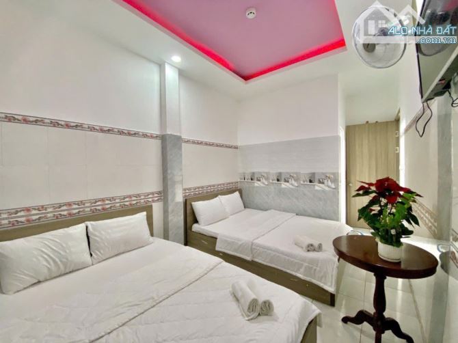 Bán Khách sạn 6 lầu MT Hà Huy Giáp 202m2 (6.5x31) 32PN DT 100tr gần cầu Phú Long 26 tỷ. - 4