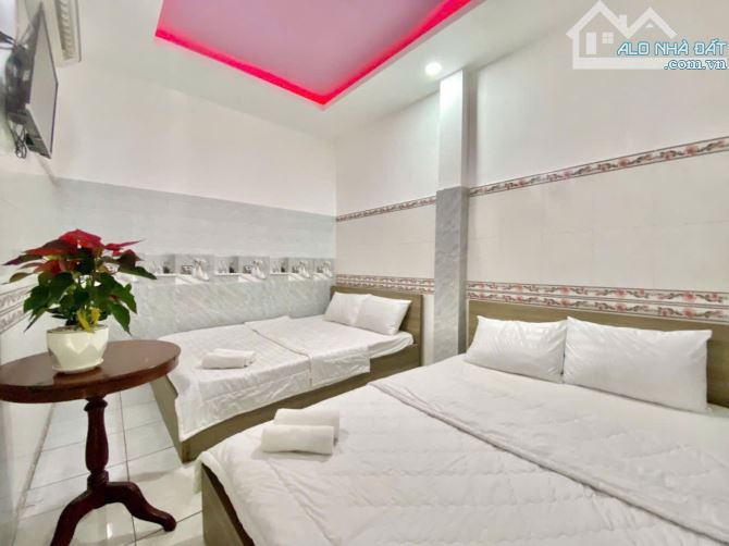 Bán Khách sạn 6 lầu MT Hà Huy Giáp 202m2 (6.5x31) 32PN DT 100tr gần cầu Phú Long 26 tỷ. - 7
