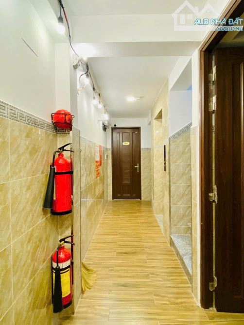 Bán Khách sạn 6 lầu MT Hà Huy Giáp 202m2 (6.5x31) 32PN DT 100tr gần cầu Phú Long 26 tỷ. - 8