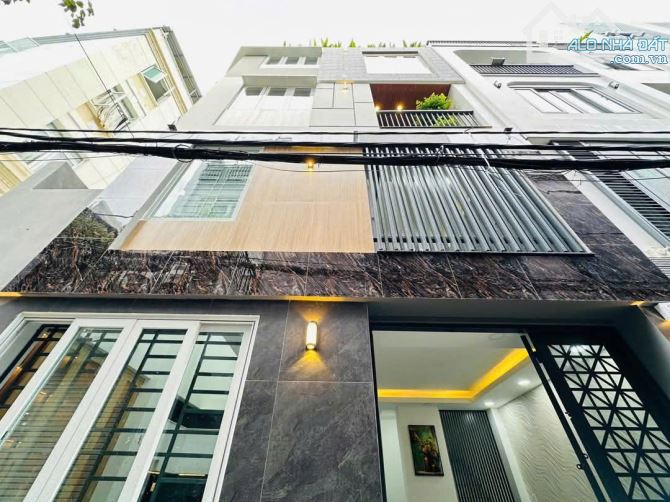 Bán nhà trệt lửng 2 lầu ST hẻm 4,5m Full nội thất Phạm Văn Chiêu giá 5,95 tỷ TL