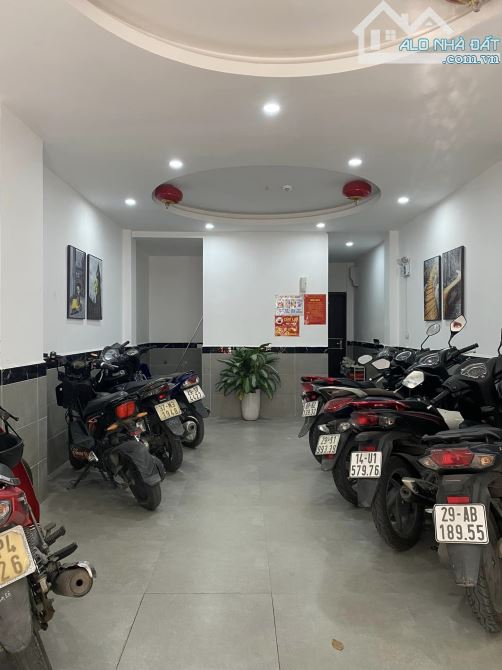 BÁN CHUNG CƯ MINI ĐỐNG ĐA, GẦN MẶT PHỐ ĐƯỜNG ÔTÔ THÔNG, 7 TẦNG THANG MÁY 11 PHÒNG KHÉP KÍN