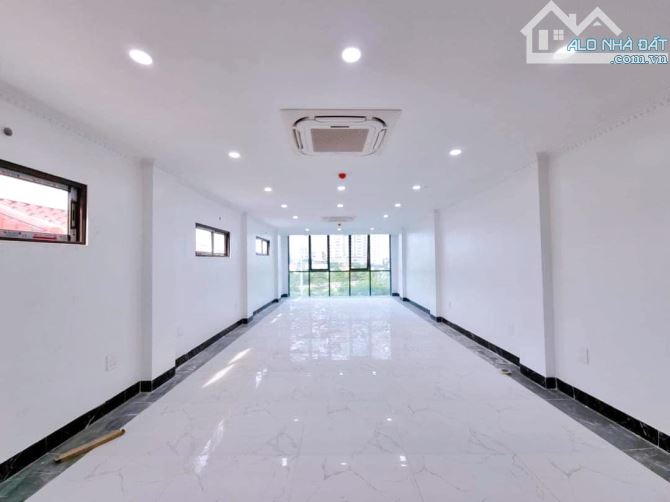 Tòa VP 9 tầng có hầm mặt ngõ Hoàng Quốc Việt, Nghĩa Đô, ô tô tránh, 90m2, MT 5m giá 40 tỷ - 1