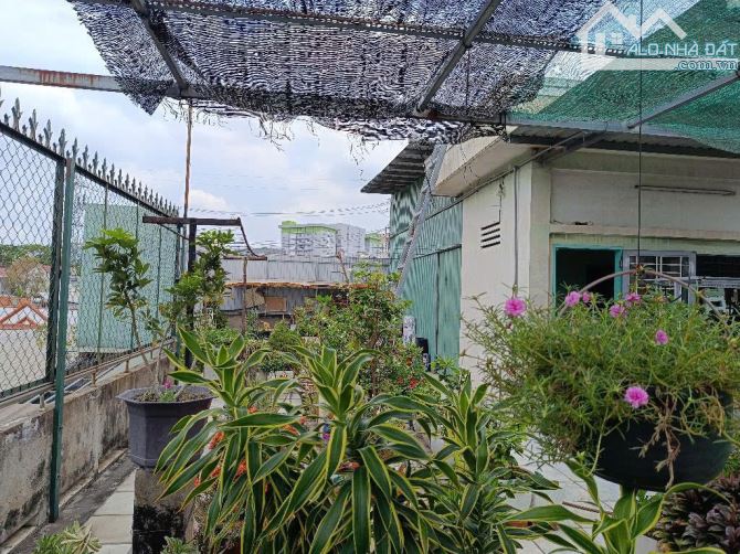 Nhà 2 tầng mặt tiền Quốc Lộ 1A, p Tân Chánh Hiệp, Q12, dt 193m2 (9,4mx25m) . Giá 12,3Tỷ - 2