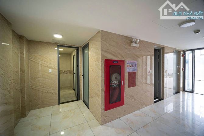 Bán tòa nhà mặt tiền Võ Văn Kiệt, đoạn gần Chu Văn An, DT 335m2, 2 hầm 10 tầng giá 130 tỷ - 2