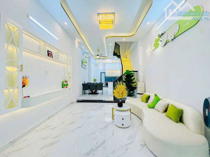Bán nhà đẹp 4 tầng,xe hơi ngủ trong nhà .Huỳnh Tấn Phát,Nhà Bè.Giá 6.8 tỷ.