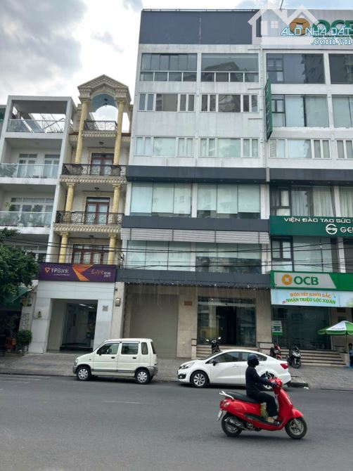 Tòa nhà 212B Nguyễn Trãi  Quận 1 DT6x20m hầm 7 lầu đẹp sang trọng Gía 36.5 ty