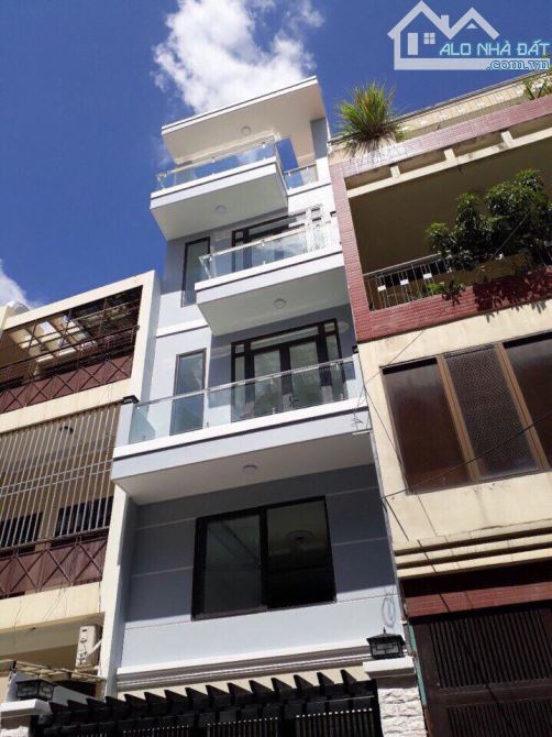 Đi định cư nên cần Bán nhà MT ngay ngã 3 Huỳnh Văn Bánh và Lê Quý Đôn 1T4L khu kinh doanh