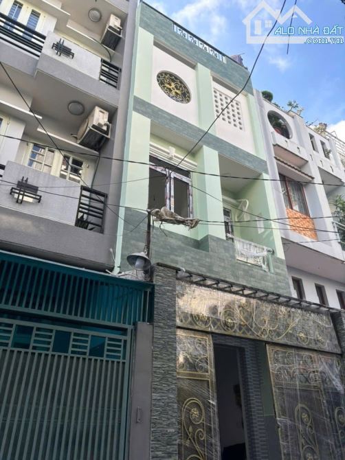 Bán nhà Phường 14 Tân Bình, Trương Công Định, hẻm xe hơi thông, 3 tầng, giá 7tỷ499