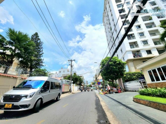 Toà nhà 2MT Nguyễn Trãi & Nguyễn Cảnh Chân, Quận 1 - 15x30m - 2 hầm 10 Tầng - HĐT 1 tỷ/th