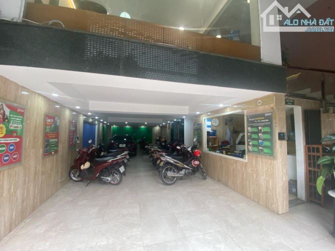 Bán tòa nhà văn phòng 8 tầng tại phố Hoàng Cầu 125m2, 8 tầng, mt 8m, 2 thoáng, chỉ 57 tỷ. - 1