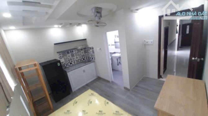 CHỈ NHỈNH 5 TỶ SỞ HỮU CHDV 7 PHÒNG - 71M2 - GIÁP QUẬN 1 - DOANH THU 30TR/THÁNG