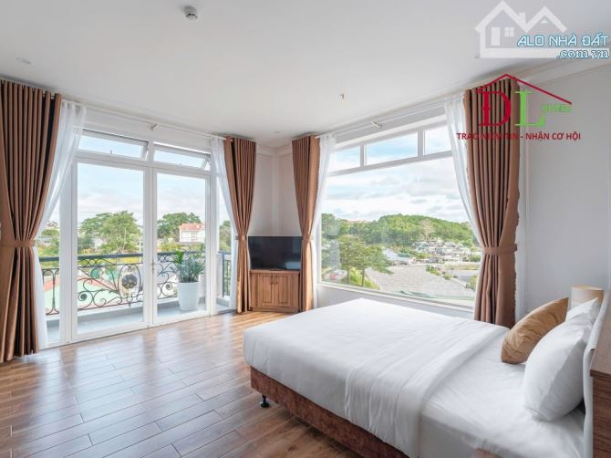 Bán khách sạn mặt tiền Hoàng Văn Thụ Đà Lạt 24PKD view đồi thông - 1