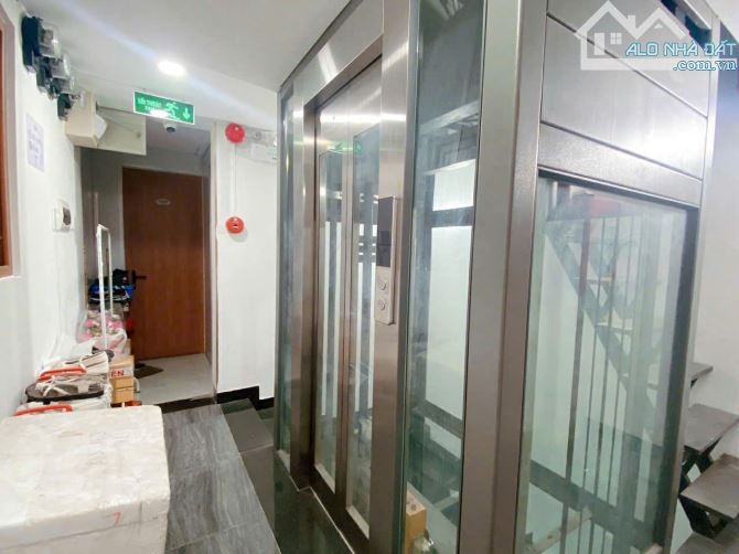 Tòa nhà CHDV Hoàng Hoa Thám 8m x 23m,hầm,thang máy,26 phòng cao cấp,khoán 130tr/th - 1