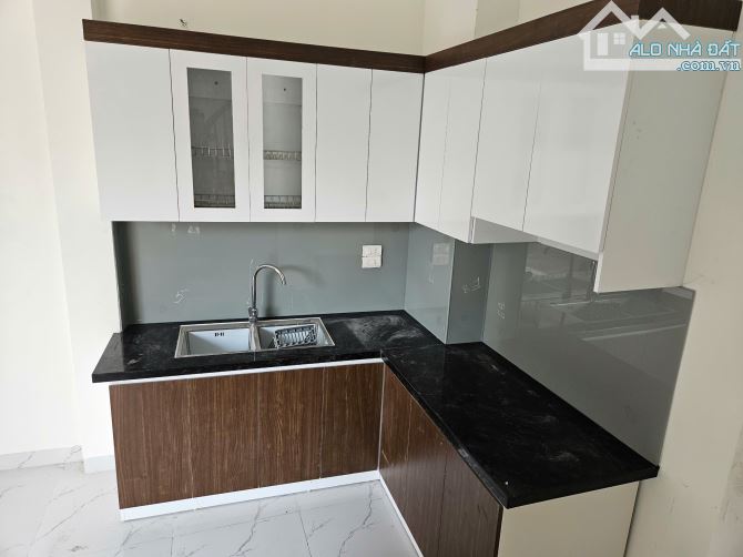 BÁN NHÀ MỚI 5 TẦNG TỪ LIÊM 34M2 MT5,6M Ô TÔ QUA CỔNG HƠN 4 TỶ - 2