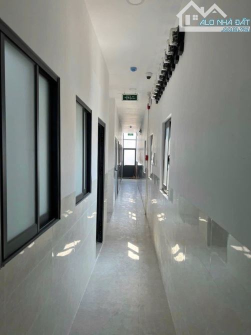 Căn Hộ Dịch Vụ 5 Tầng hẻm 6m gần Đại Học Văn Lang, 7x30m (NH: 17m), HĐT 145 triệu, 29 Tỷ - 1