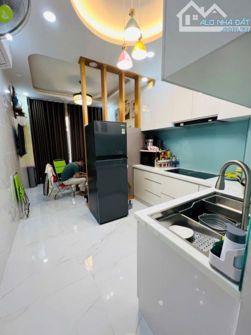 Nhà 4 tầng hẻm xe hơi đường Nguyễn Đình Chiểu phường 4 quận 3 - 1