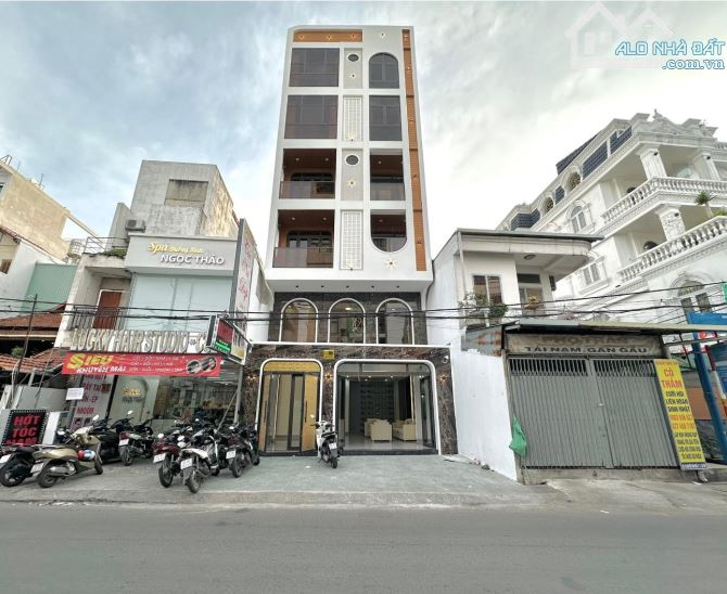 BÁN CCMN DOÃN KẾ THIỆN 100M2X8T, MT=6M, 28PKK, Ô TÔ TRÁNH,2.2 TỶ/NĂM~34.7 TỶ