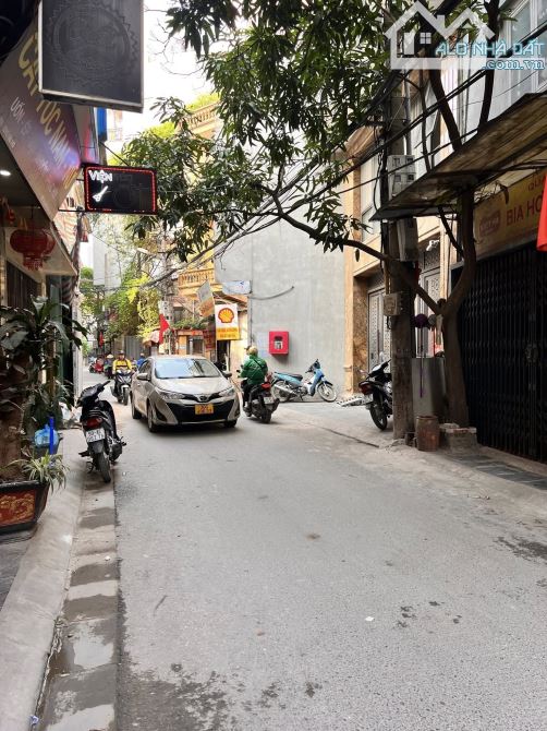 BÁN NHÀ HOÀNG VĂN THÁI SIÊM PHẨM . Ô TÔ . THANG MÁY. MT 5 M . NHÀ 6 TẦNG , GIÁ 18,6 Ỷ