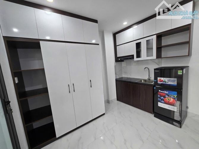 Bán toà CHDV Kim Mã, 2 thoáng, PCCC, 65m2*7T, 15 Phòng KK full NT, dòng tiền 100 triệu/ th - 1