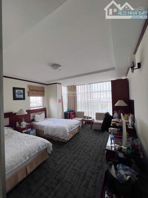 Chủ cần bán gấp khách sạn ĐỐNG ĐA, 70m , giá chỉ 23 tỷ,10 tầng thang máy, kinh doanh,lôgóc - 1