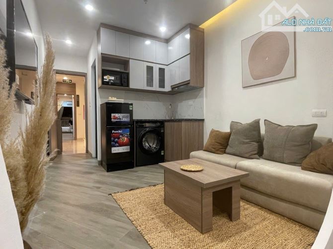 HOT NHẤT CẦU GIẤY LÚC NÀY! Nhà 60m2, 2 mặt thoáng, 10 căn full đồ- lãi gần 1 tỷ/năm - 2