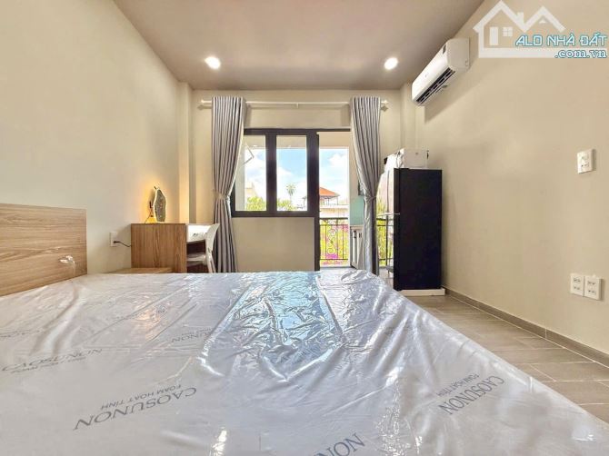 Cho thuê phòng ban công 50m2 gần công viên Lê Văn Tám_máy giặt riêng_nội thất đủ_tách bếp - 2