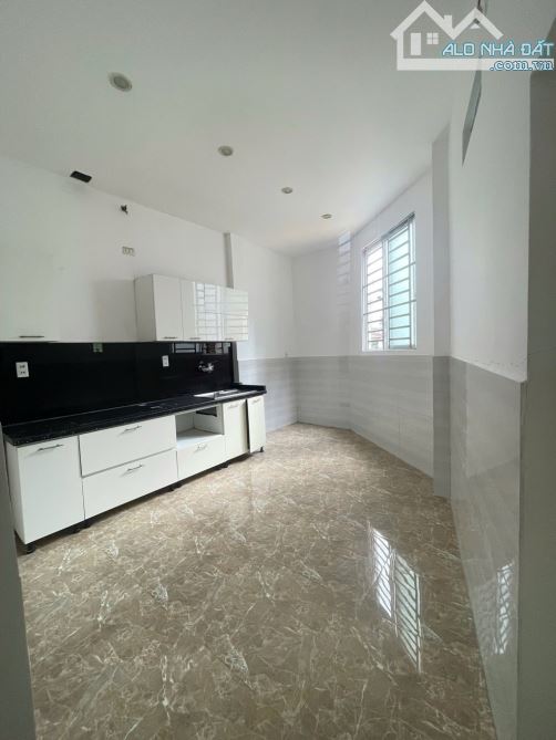 NHÀ 4 TẦNG KIÊN CỐ 2 MẶT THOÁNG DIỆN TÍCH ĐẤT 80M2 KIỆT XE TĂNG 7M TRUNG TÂM TP NHỈNH 6TỶ - 4