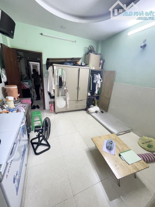 TRẦN PHÚ QUẬN 5 DT 45M2 5 TẦNG 6PN HẺM 4M, THÔNG RA HẺM 565 NGUYỄN TRÃI - 4