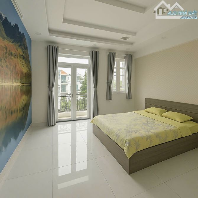 "nhà đẹp 5 tầng ngay Phan Huy Ích 74.1(4m2x17m)  XE TẢI 6mTHÔNG - Ô TÔ NGỦ TRONG NHÀ - 5 T - 4