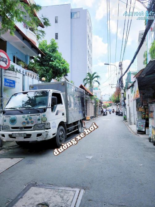 bán nhà mặt tiền trung tâm phú nhuận. Nhà mới full nội thất. Đường xe hơi. một trệt 2 lầu - 5