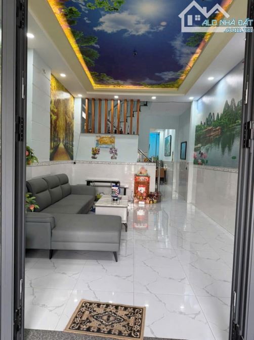 Nhà trệt lầu Thị trấn Hóc Môn,73m2 (4x15)m, xây kiên cố, SHR, hoàn công đủ, Gần chợ, 1t950 - 1