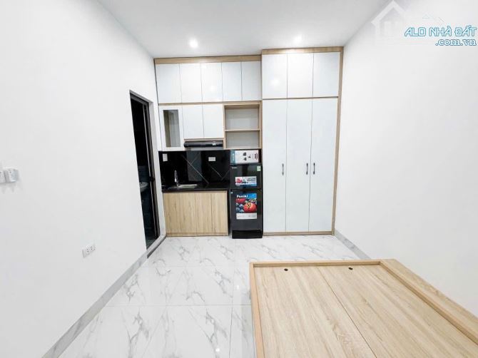 CHDV PHÚ ĐÔ, Ô TÔ ĐỖ CỬA, 60M2, 7 TẦNG, 16 PHÒNG CHO THUÊ, DT 1 TỶ/NĂM - 2