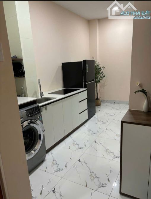 Bán gấp tòa nhà đường Phan Thúc Duyện 8 tầng. Ngang 6.2x29m. Thu nhập trên 100 triệu/tháng - 2