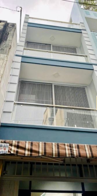 BÁN NHÀ ĐẸP – SÁT MẶT TIỀN ĐỘI CUNG, P9, Q11 – XE HƠI NGỦ TRONG NHÀ – 4 TẦNG