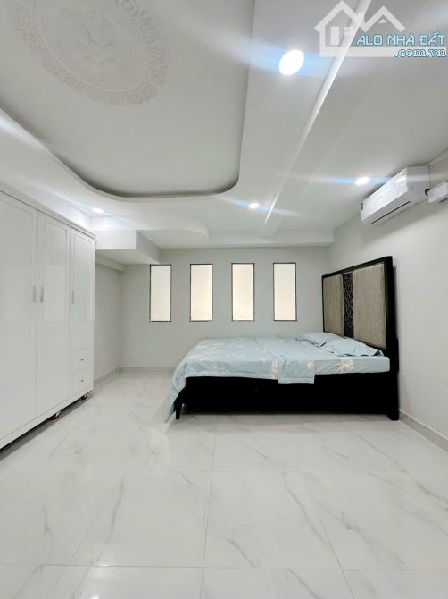 Bán tòa CHDV đường  bạch đằng p15 bình thạnh dt 9x23 kc 7 tầng sẵn hợp đồng thuê - 1