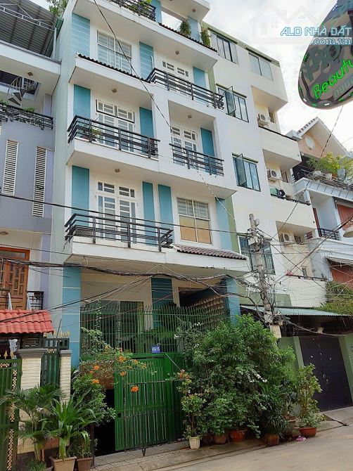 Toà nhà 6 lầu Văn Phòng kết hợp ở đường CMT8 Q.3 khu nội bộ HXT 8m Giá:32.5 Tỷ