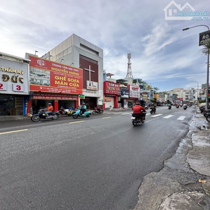 MẶT TIỀN LẠC LONG QUÂN - TÒA NHÀ VĂN PHÒNG 7 TẦNG 77M2 - CÓ THANG MÁY - GIÁ 15.X TỶ