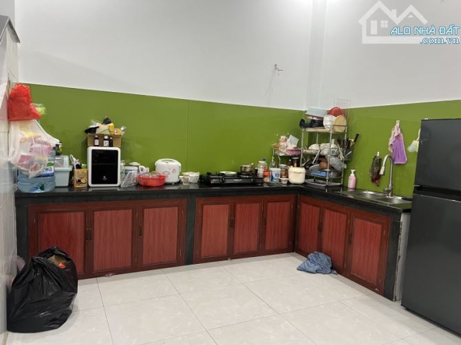 Bán nhà 100m2 1 Trệt 1 Lầu Dĩ An,đường nhựa 2 xe hơi,gần ĐHQG TPHCM - 1