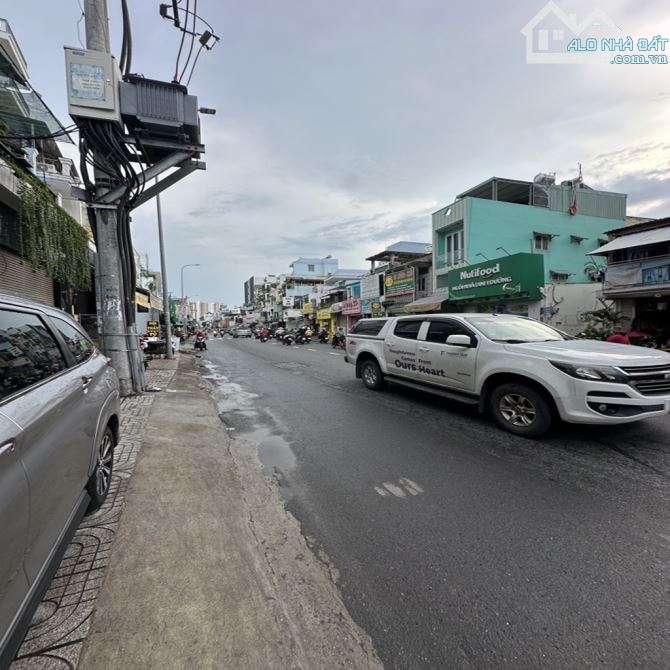 MẶT TIỀN LẠC LONG QUÂN - TÒA NHÀ VĂN PHÒNG 7 TẦNG 77M2 - CÓ THANG MÁY - GIÁ 15.X TỶ - 1