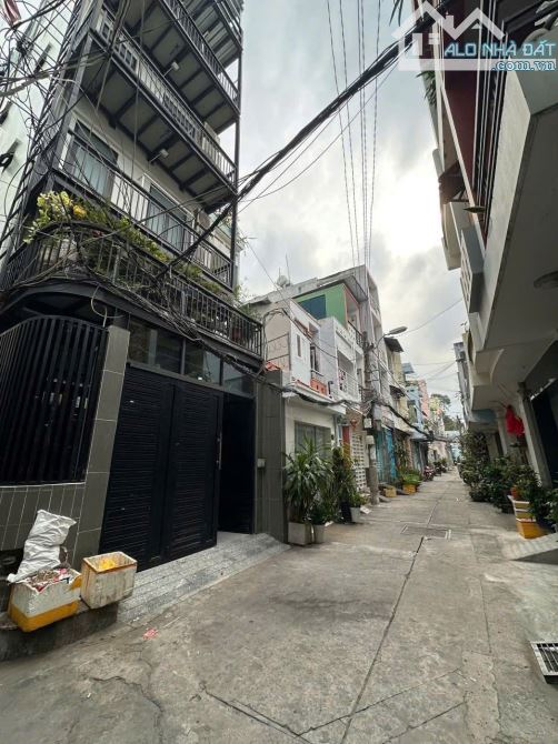 Bán nhà góc 2 mặt tiền Phan Đăng Lưu P3 Q.BT 14P 75m2 Giá 17 Tỷ - 2