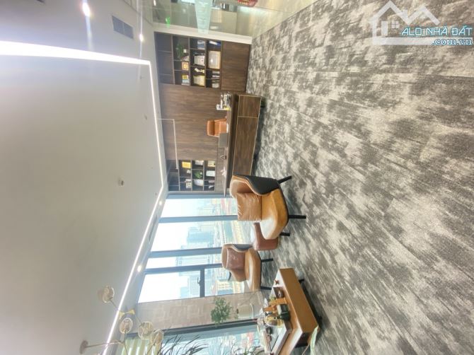 Tòa nhà mặt phố Bà Triệu10 tầng thang máy DT 422m2, MT rộng 199 tỷ