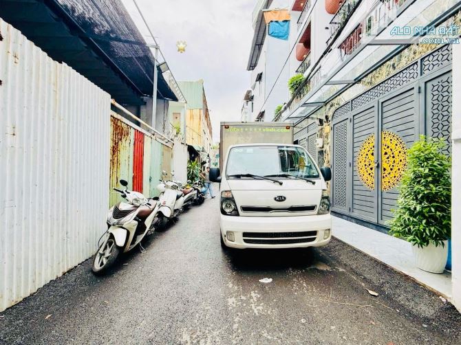 Bán nhà Lê Văn Thọ Gò Vấp, xe tải đậu cửa, 4 tầng mới xây, full nội thất, giá 7 tỷ 6 nhỉnh