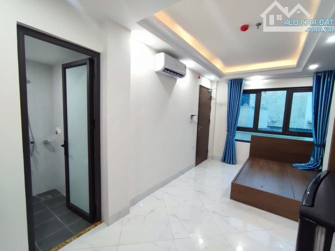 Tổng 11 phòng cho thuê - 50m2 - 2 mặt ngõ - 7 tầng thang máy cách phố Cự Lộc 30m - 11 tỷ - 2