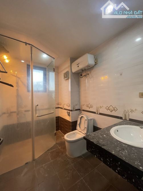 LÂM DU 50m.12 TỶ.7 TẦNG.6.5MT MẶT PHỐ Ô TÔ TRÁNH - LÔ GÓC - THANG MÁY - 6